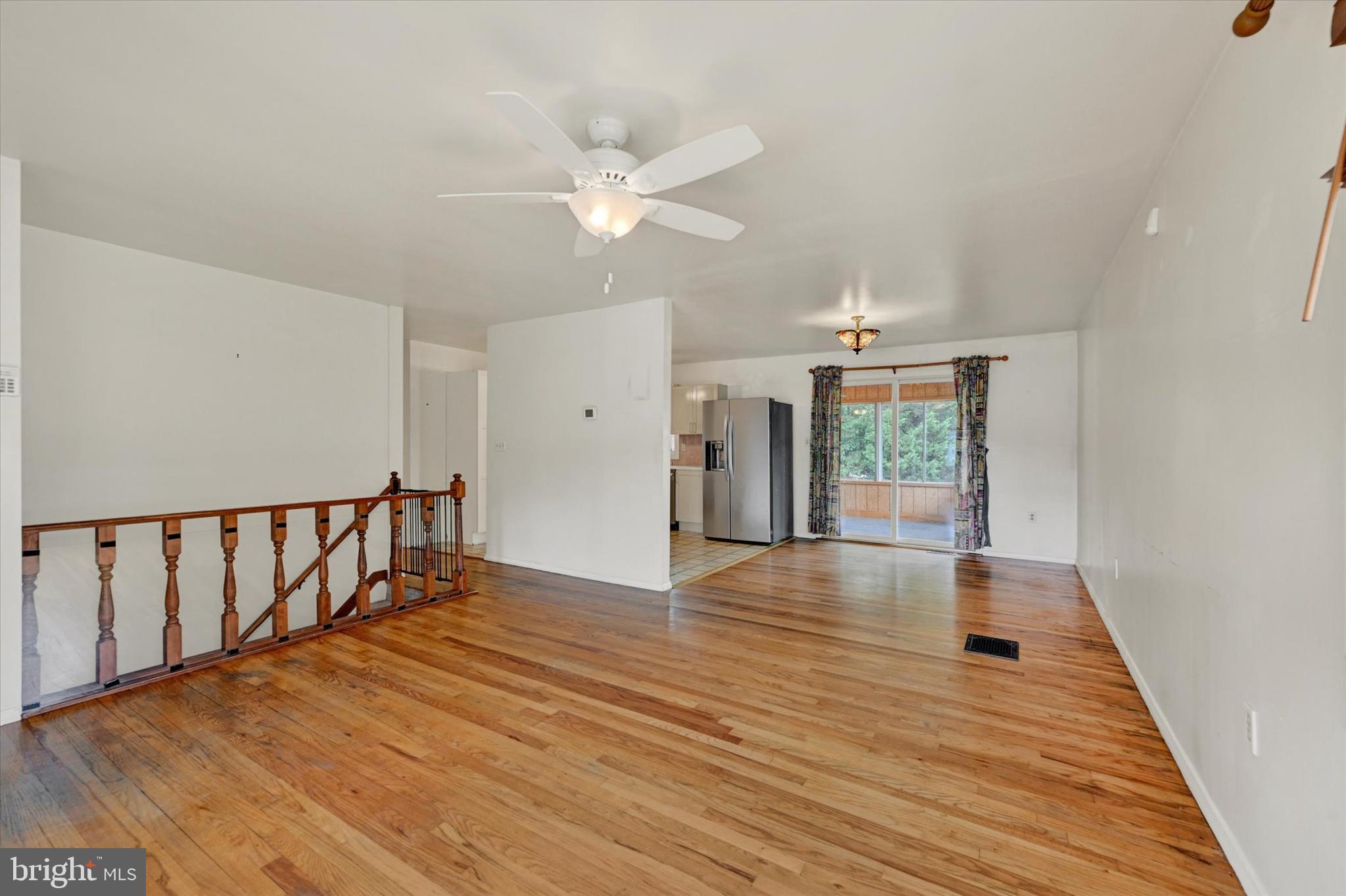 306 Regency Circle Linthicum Heights, MD 21090 - Photo 5 of 73 Welcoming living room with wood floors.