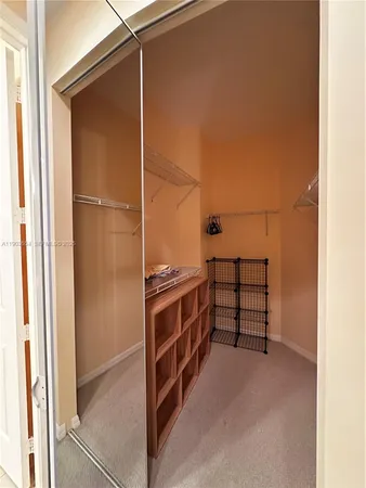a view of a living room and bathroom
