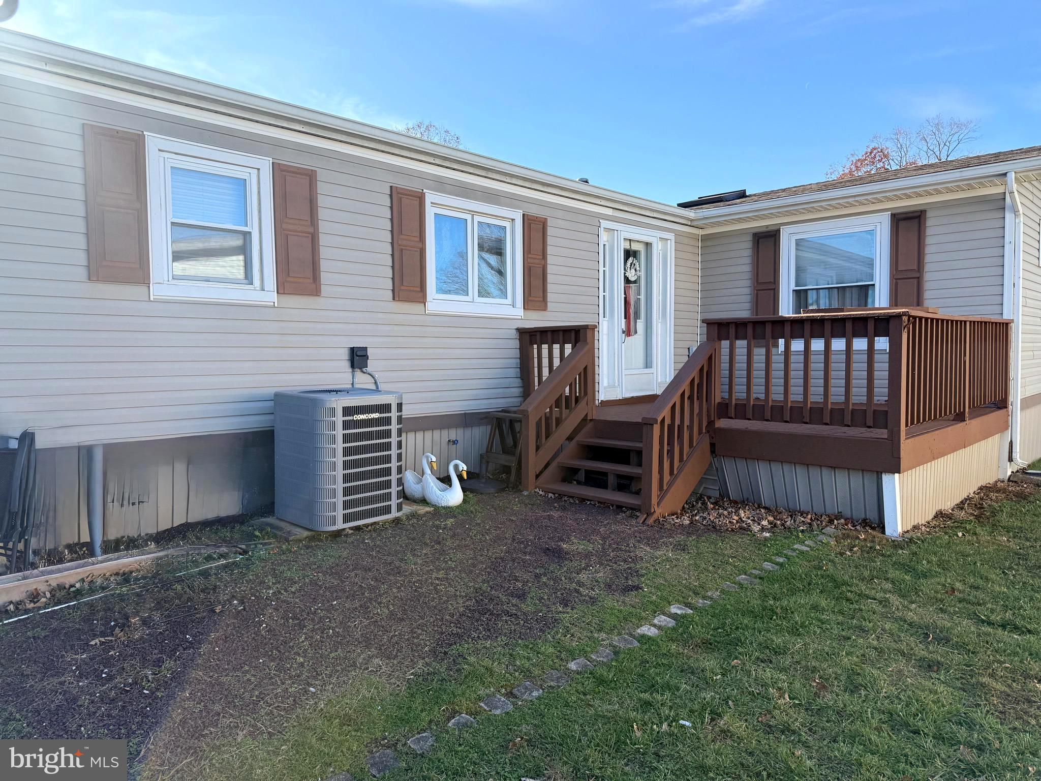 443 Priscilla Lane Buena, NJ 08310 - Photo 29 of 44 a view of a house with a yard and deck