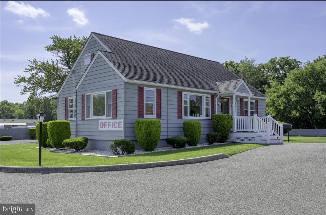 443 Priscilla Lane Buena, NJ 08310 - Photo 33 of 44 a front view of house with yard and green space