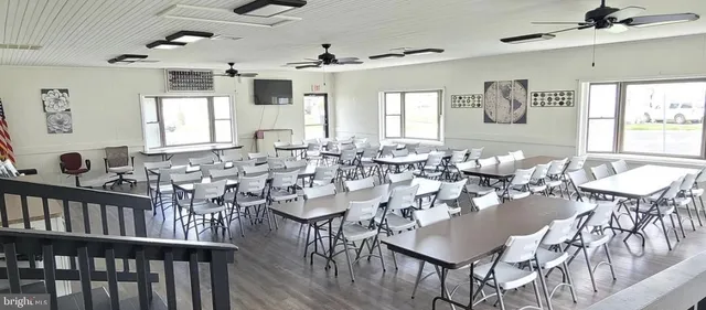 a kitchen with cabinets appliances and a counter space