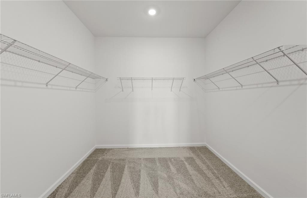 44357 Kelly Drive Punta Gorda, FL 33982 - Photo 15 of 24 a view of a room with racks on the wall