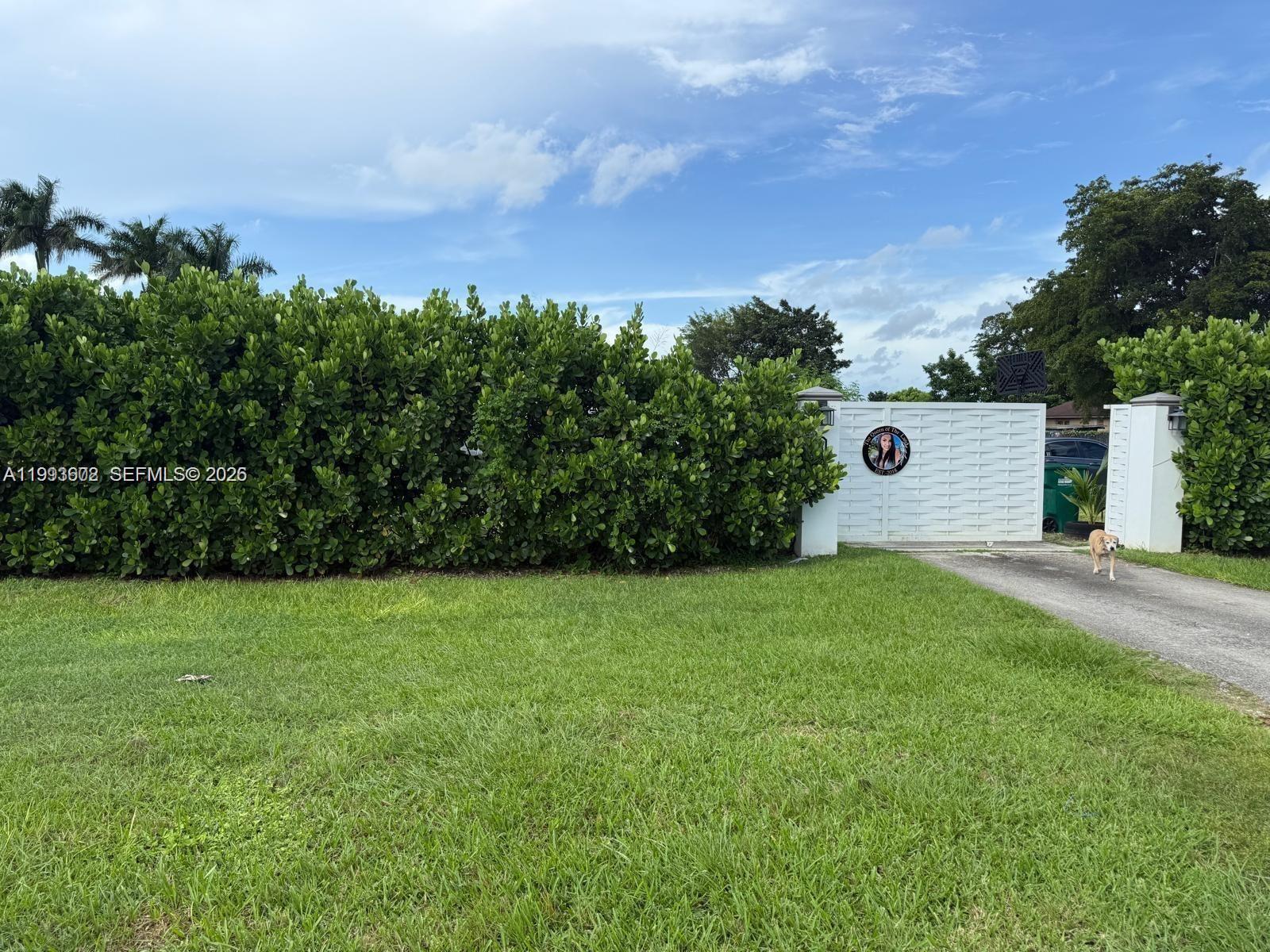 18441 Southwest 238th Street Homestead, FL 33031 - Photo 12 of 12 view of outdoor space and yard