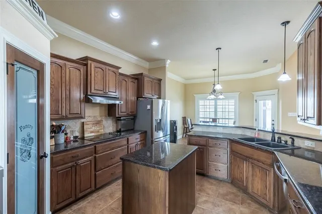 a bed room with a bed and a window