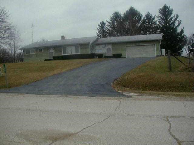 10406 Becker Road Savanna, IL 61074 - Photo 1 of 5 a view of a house with a yard