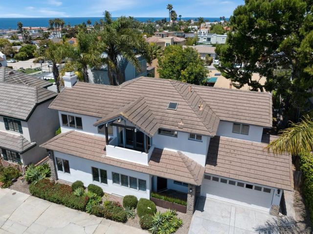 a view of a house with a roof deck