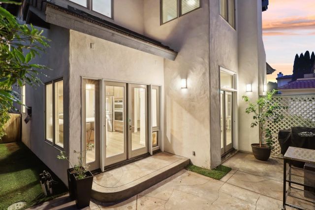 a view of a balcony with hardwood