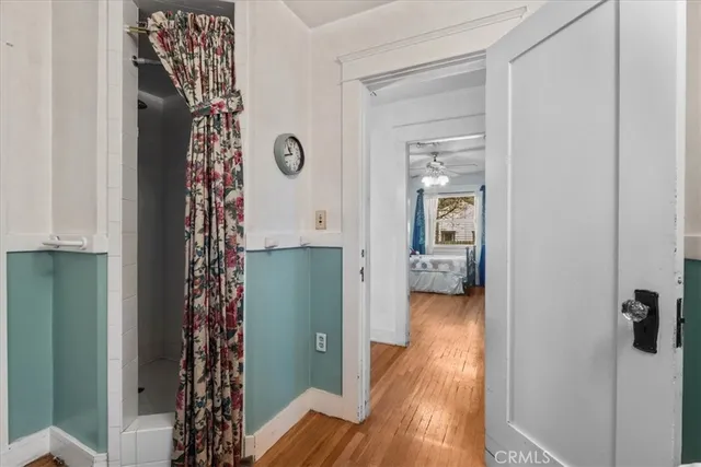 a view of entryway with wooden floor