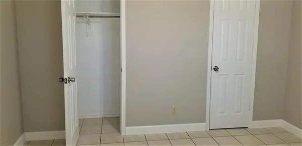 a view of swimming pool with a house in the background