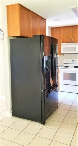 a bathroom with a glass door shower