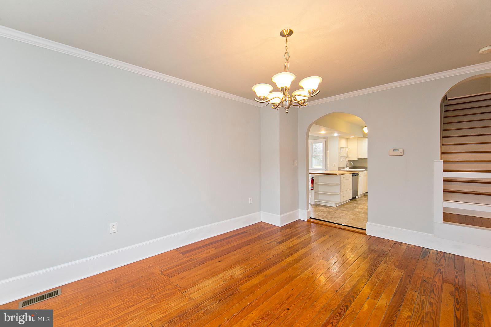 713 Rileyville Road Rileyville, VA 22650 - Photo 26 of 54 wooden floor in an empty room with a window
