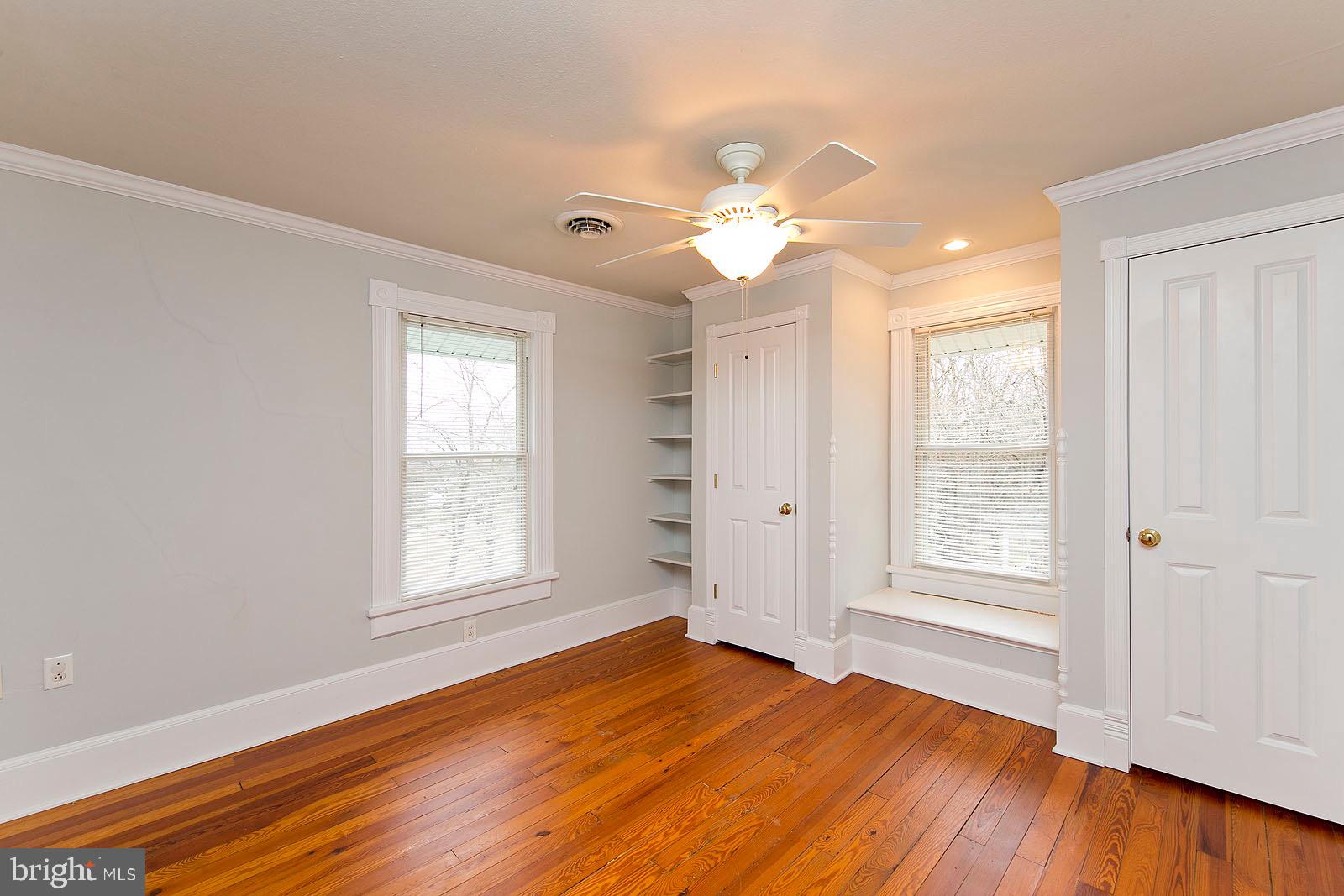 713 Rileyville Road Rileyville, VA 22650 - Photo 32 of 54 wooden floor in an empty room with a window