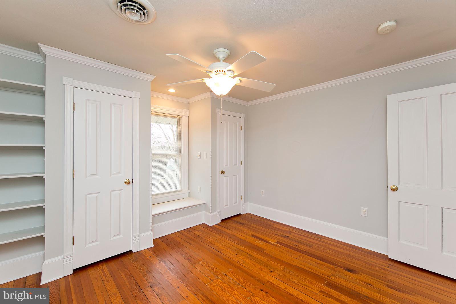 713 Rileyville Road Rileyville, VA 22650 - Photo 33 of 54 a view of empty room with wooden floor and fan