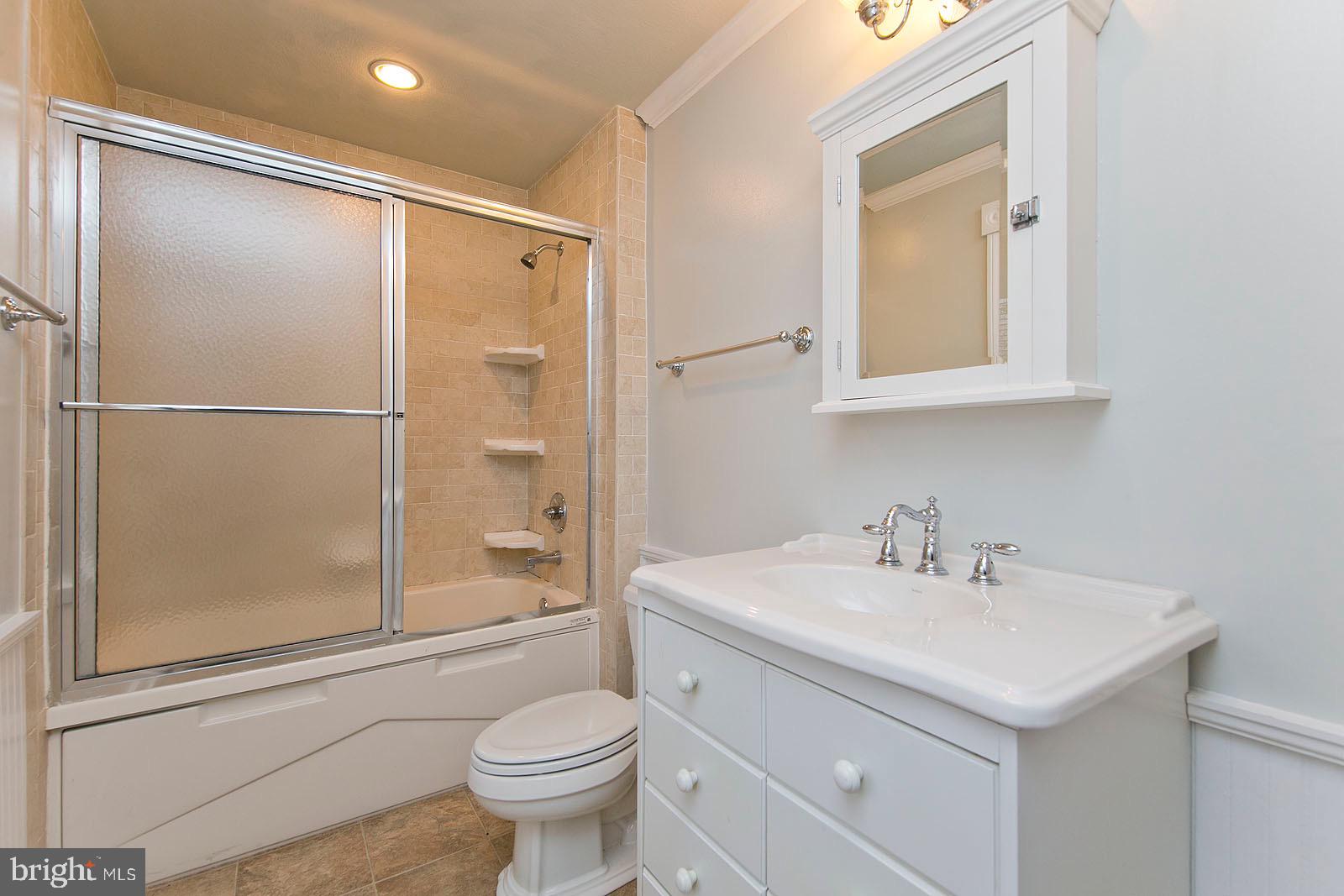 713 Rileyville Road Rileyville, VA 22650 - Photo 40 of 54 a bathroom with a sink toilet and shower