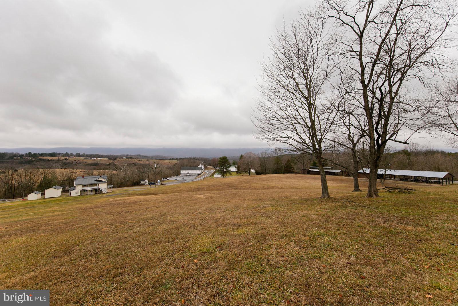 713 Rileyville Road Rileyville, VA 22650 - Photo 54 of 54 a view of a lake with houses in the back