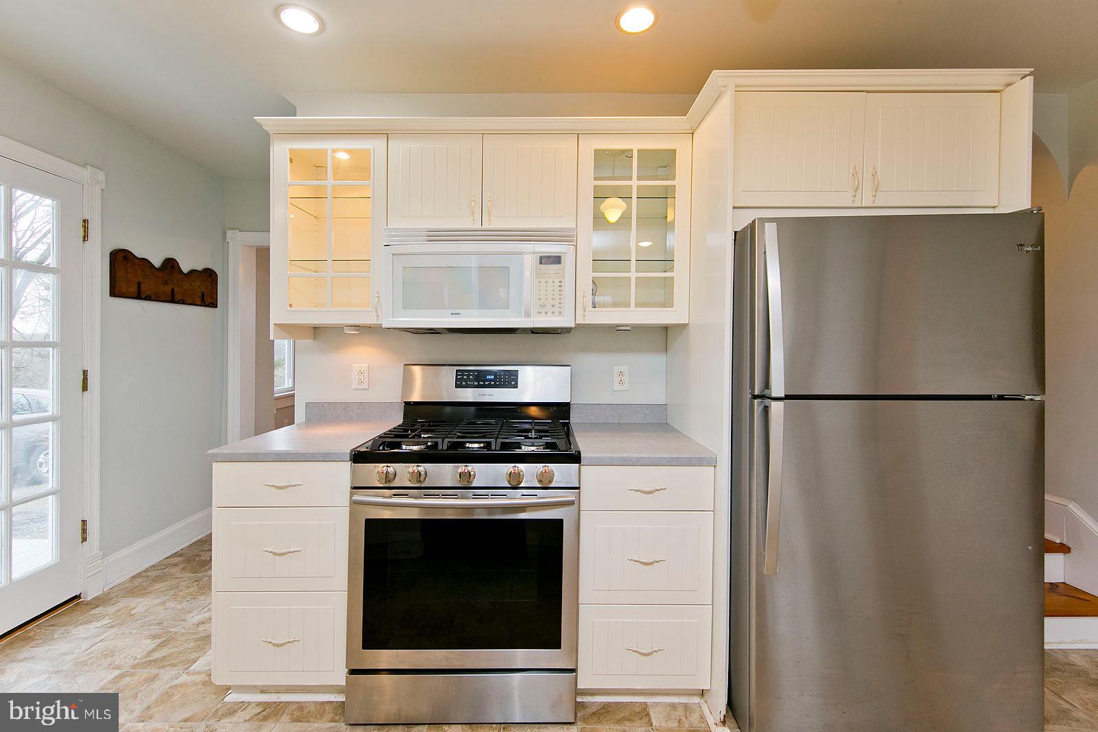 713 Rileyville Road Rileyville, VA 22650 - Photo 8 of 54 a kitchen with a stove top oven and refrigerator