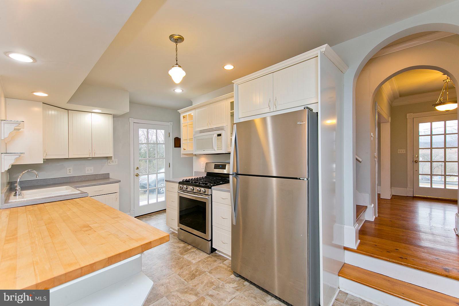 713 Rileyville Road Rileyville, VA 22650 - Photo 9 of 54 a kitchen with stainless steel appliances granite countertop a refrigerator and a sink