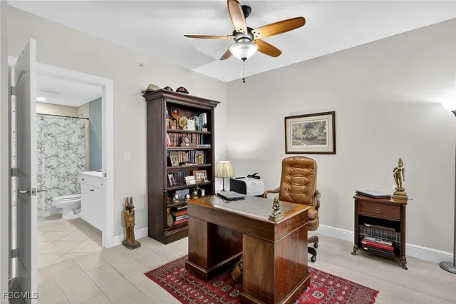 a view of a workspace with furniture