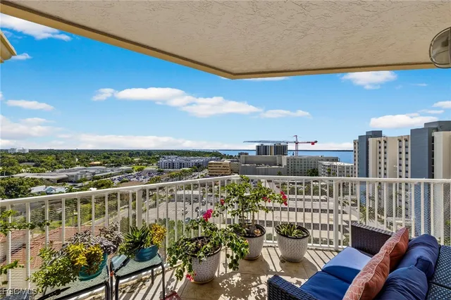 a view of a balcony with city view