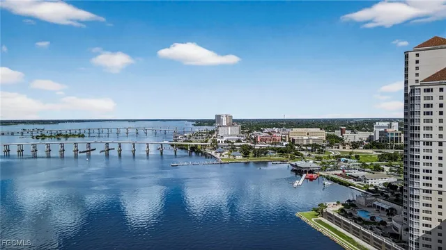 an aerial view of a house with a lake view