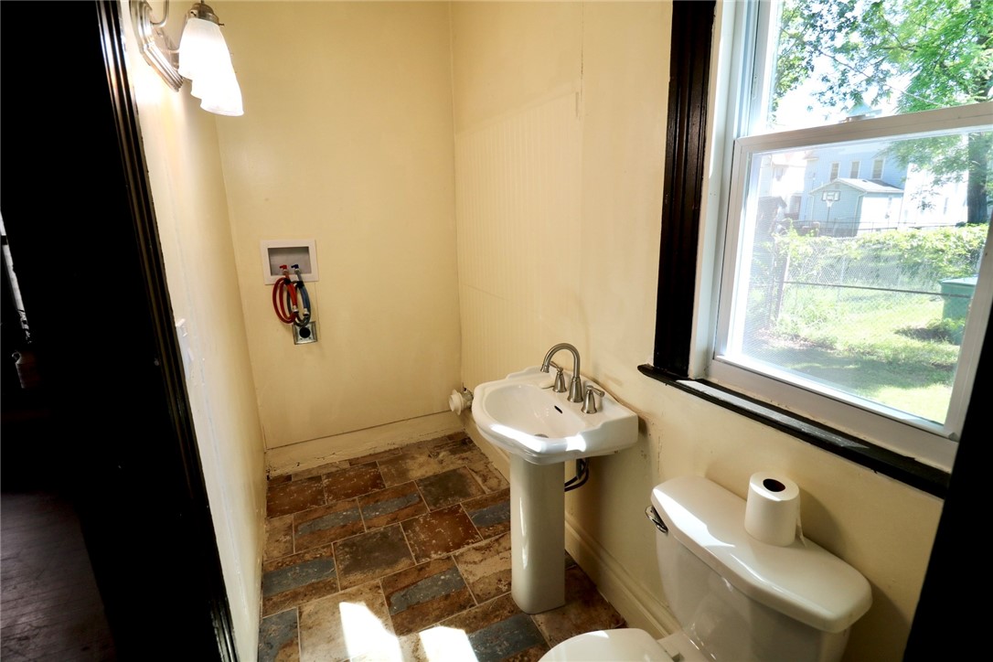 75 Peck Street Rochester, NY 14609 - Photo 40 of 46 First floor powder room with laudry hookup