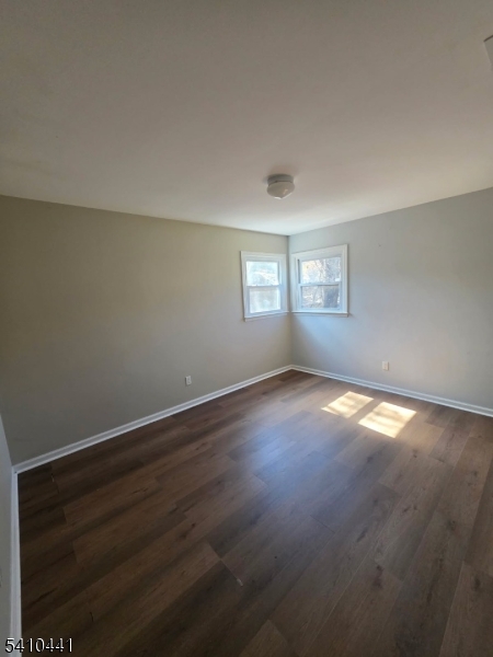 14 Oliver Road Landing, NJ 07850 - Photo 13 of 17 an empty room with wooden floor and windows