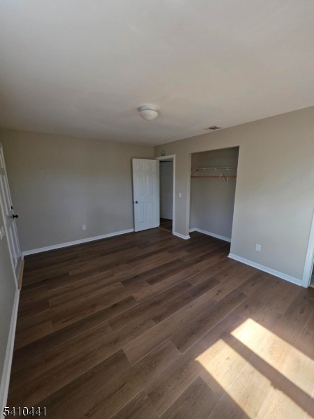 14 Oliver Road Landing, NJ 07850 - Photo 15 of 17 a view of room and wooden floor