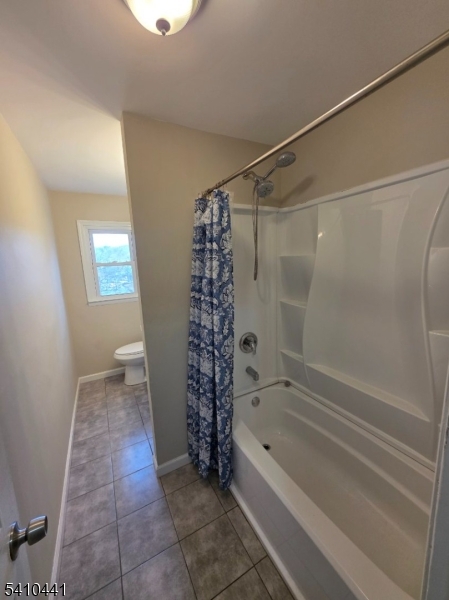 14 Oliver Road Landing, NJ 07850 - Photo 8 of 17 a bathroom with a bathtub and a shower