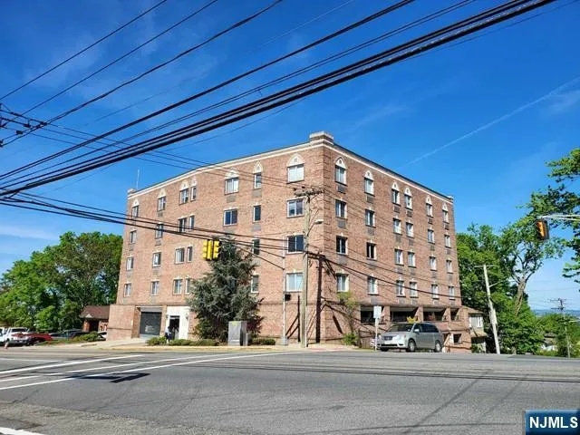 a large building with a street sign