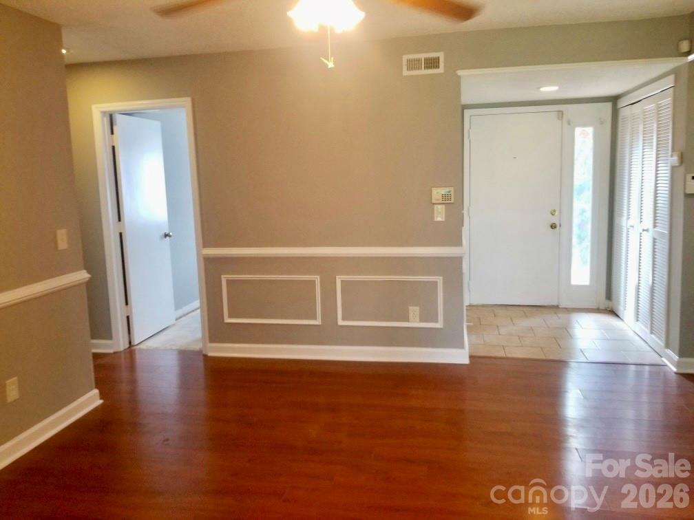 11027 Harrowfield Road Charlotte, NC 28226 - Photo 7 of 15 a view of a livingroom with wooden floor