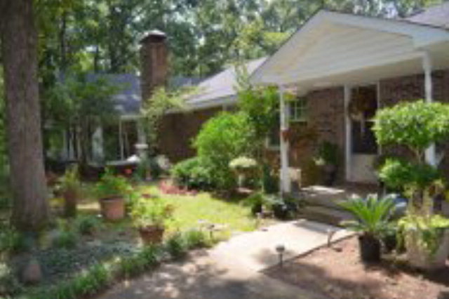 411 Garr Road Jackson, GA 30233 - Photo 1 of 1 a view of a house with plants and trees