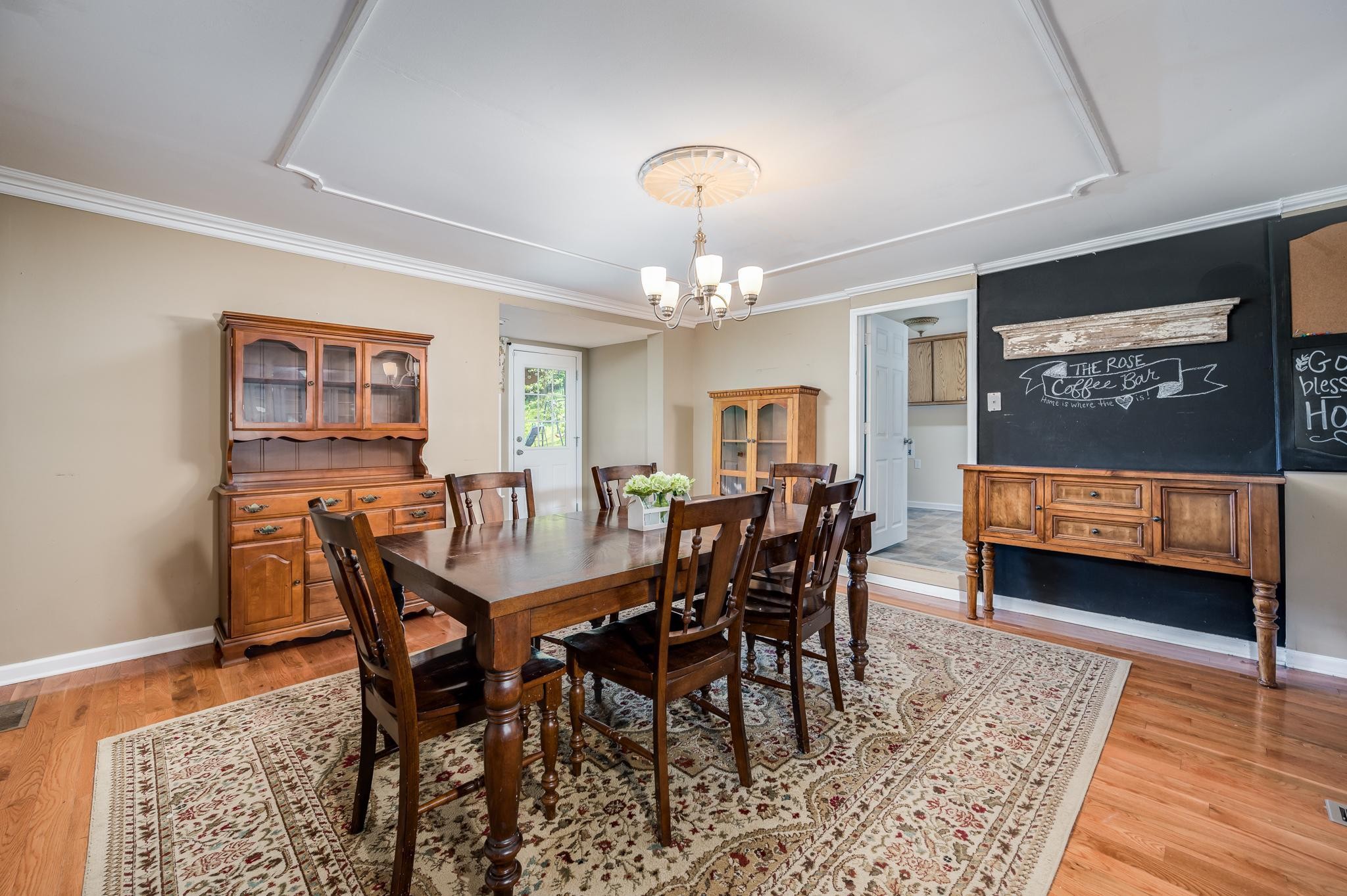 2630 Little Texas Road Goodspring, TN 38460 - Photo 8 of 39 a view of a dining room with furniture and chandelier
