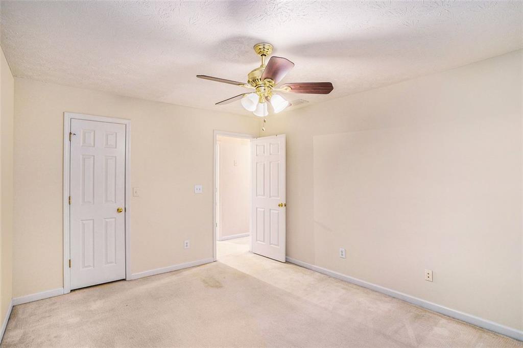 3205 Haleys Way Southeast Conyers, GA 30013 - Photo 22 of 25 a view of a chandelier fan in a room