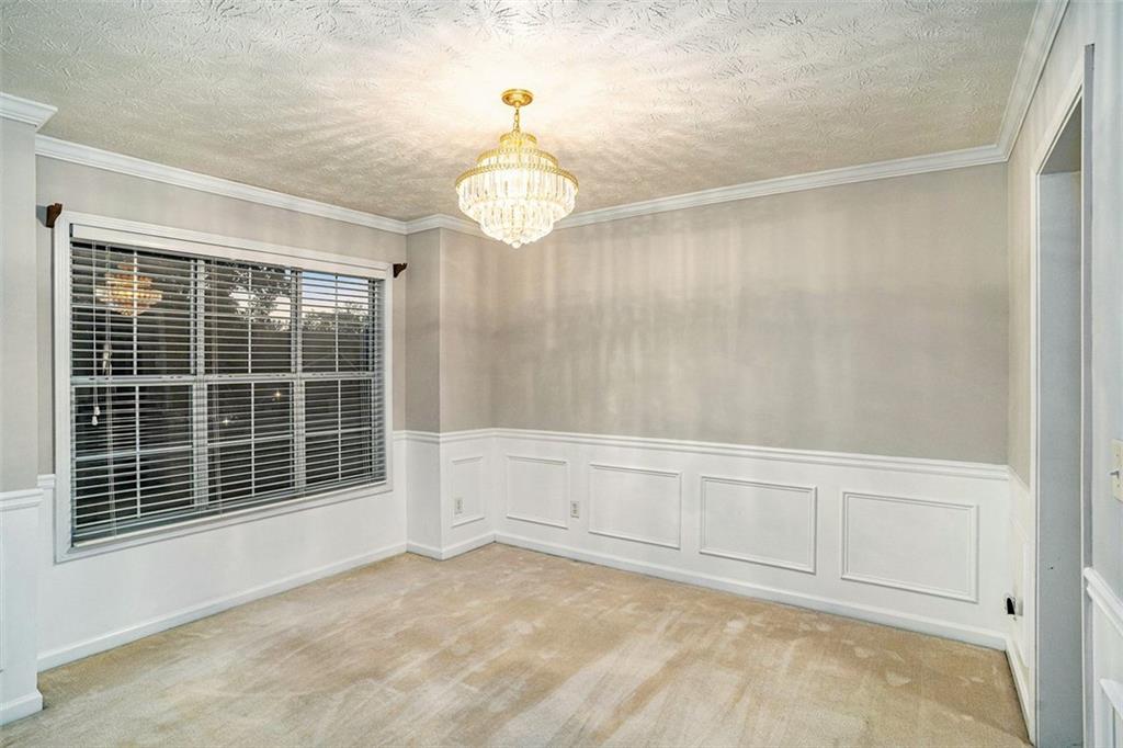 3205 Haleys Way Southeast Conyers, GA 30013 - Photo 3 of 25 a view of an empty room with a window