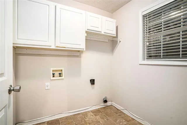 a view of a closet and window