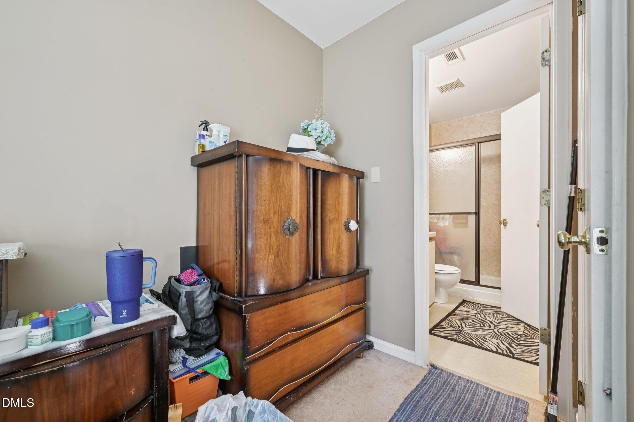 2706 Ramblegate Lane Durham, NC 27705 - Photo 12 of 28 a room with storage and utility