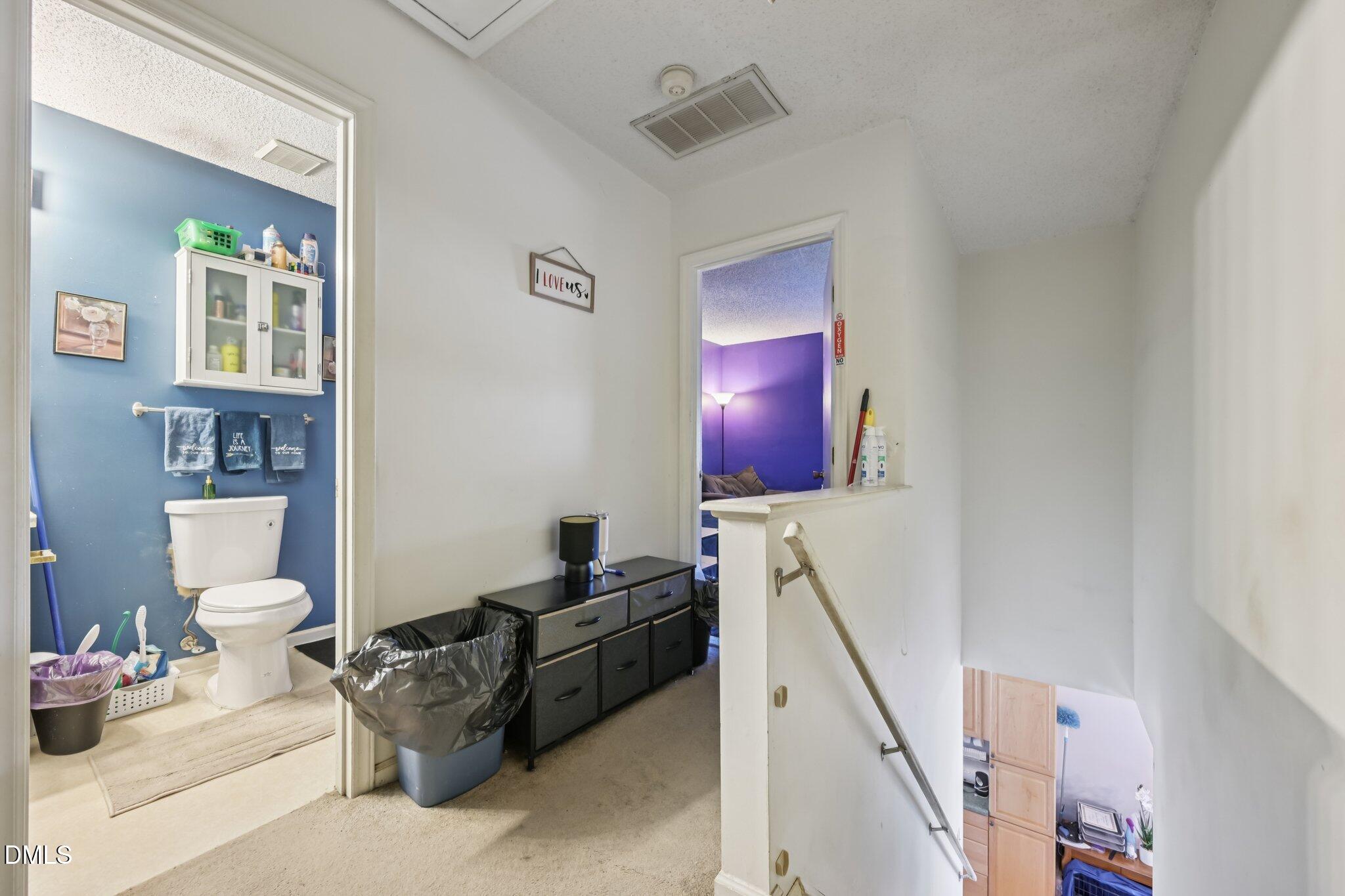 2706 Ramblegate Lane Durham, NC 27705 - Photo 16 of 28 a living room with furniture and a flat screen tv