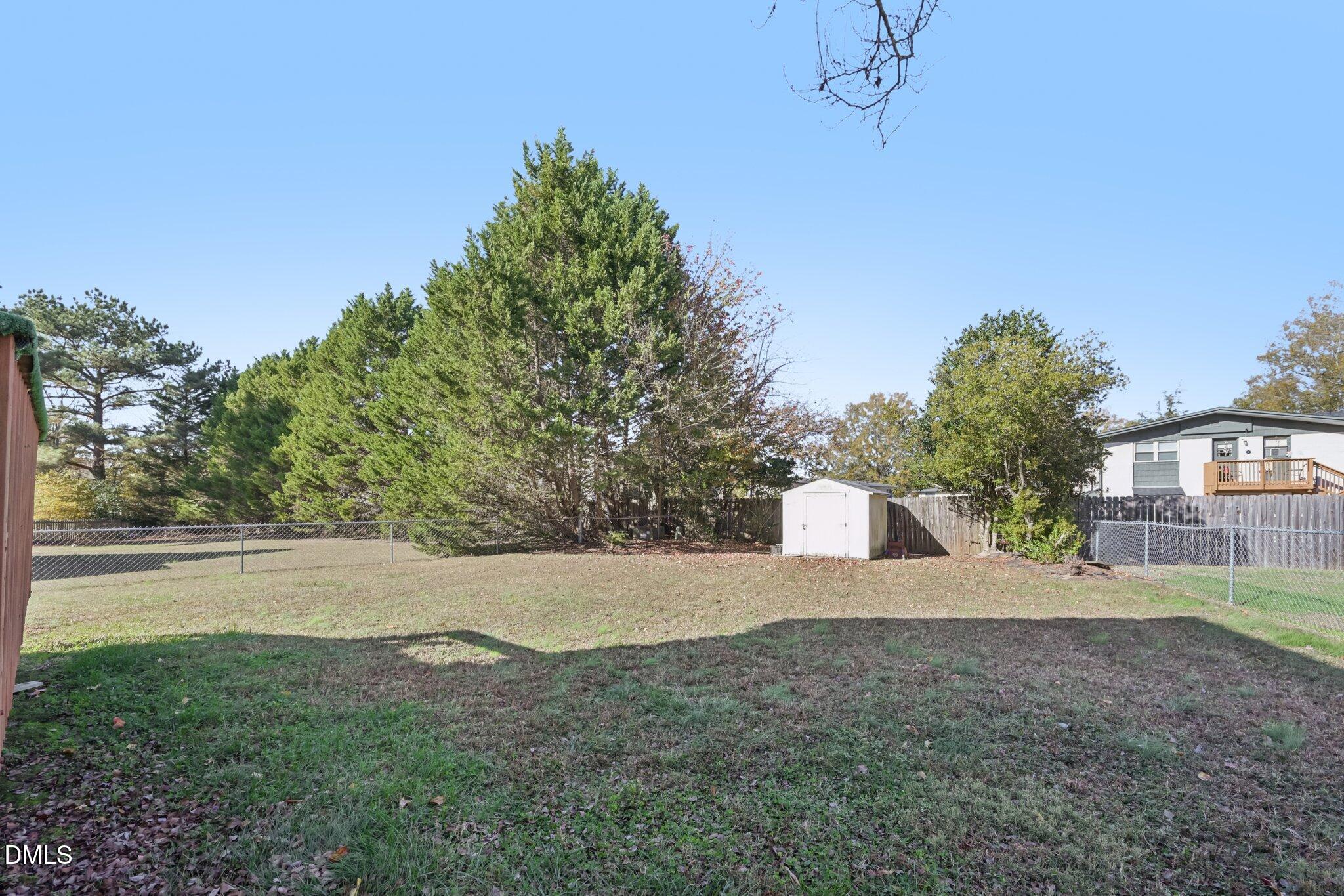 2706 Ramblegate Lane Durham, NC 27705 - Photo 23 of 28 a view of a outdoor space and yard