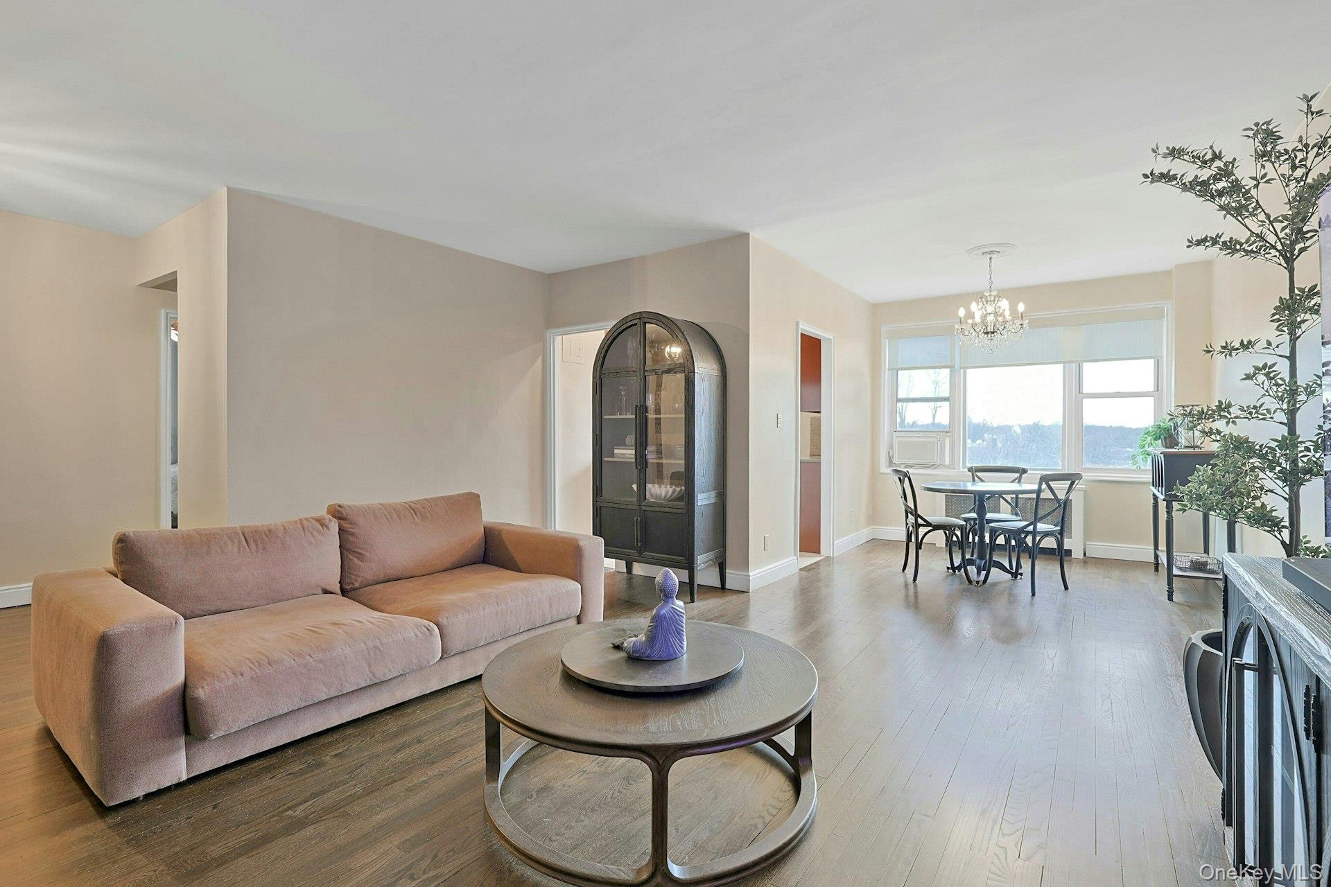 1255 North Avenue, Unit B5M New Rochelle, NY 10804 - Photo 2 of 14 Spacious living room with great light open to dining area