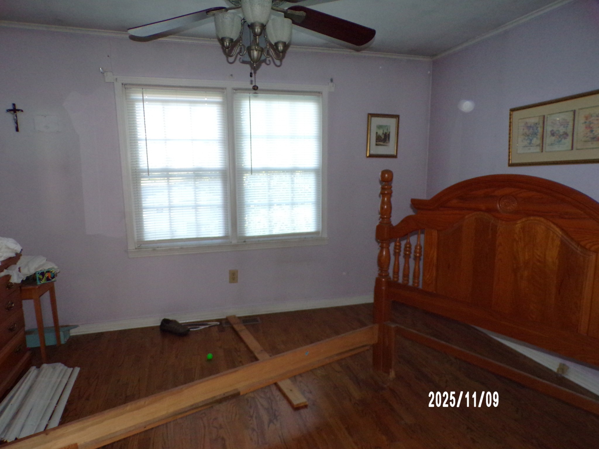 186 North Forrest Avenue Camden, TN 38320 - Photo 11 of 26 a bedroom with a bed and a window