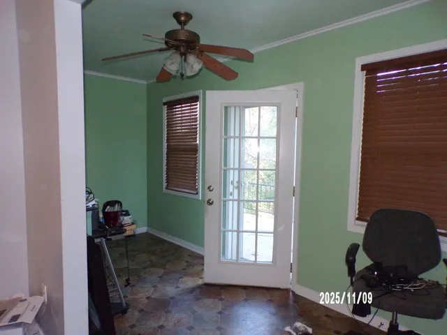 a view of room with a window and gym equipment
