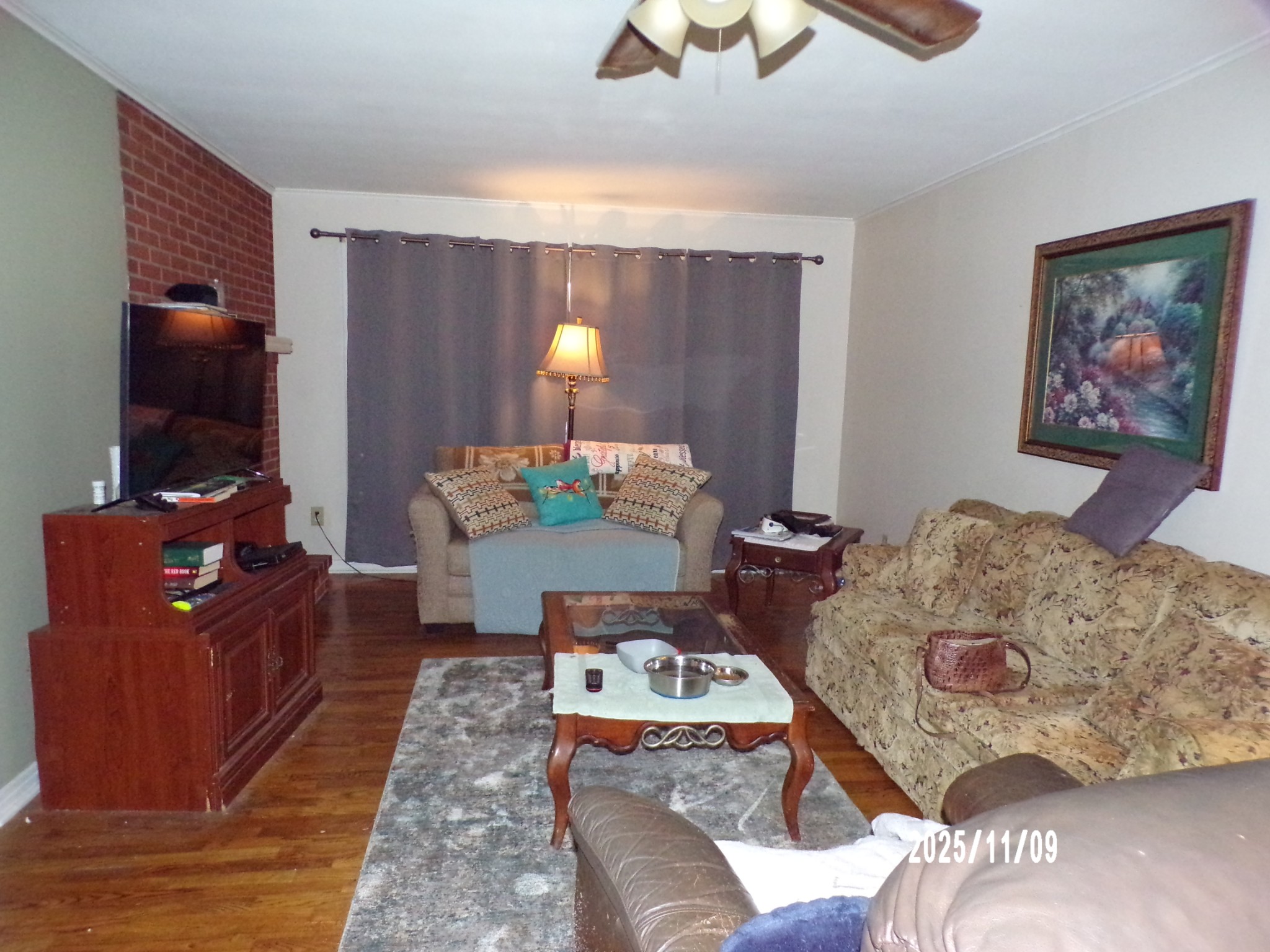 186 North Forrest Avenue Camden, TN 38320 - Photo 23 of 26 a living room with furniture and a flat screen tv