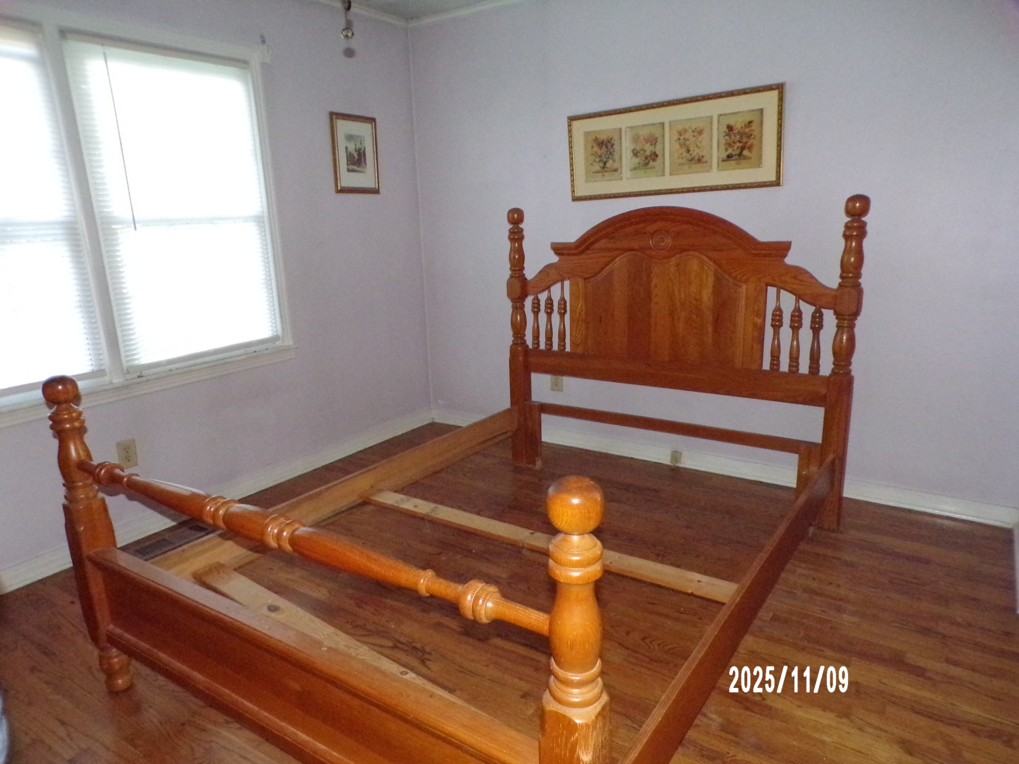 186 North Forrest Avenue Camden, TN 38320 - Photo 25 of 26 a blue chair sitting next to a window