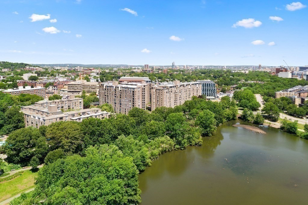 33 Pond Avenue, Unit 405 Brookline, MA 02445 - Photo 17 of 17 a view of a lake with houses