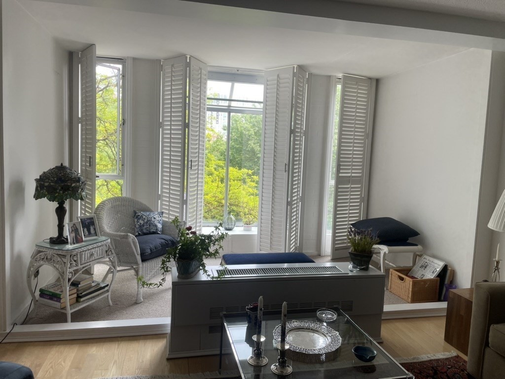 33 Pond Avenue, Unit 405 Brookline, MA 02445 - Photo 7 of 17 a room with furniture and a window