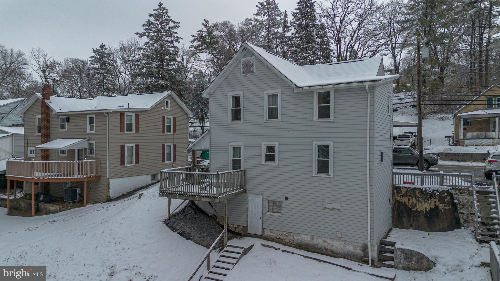 925 West Water Street Bellefonte, PA 16823 - Photo 20 of 23 a view of a house with backyard and sitting area