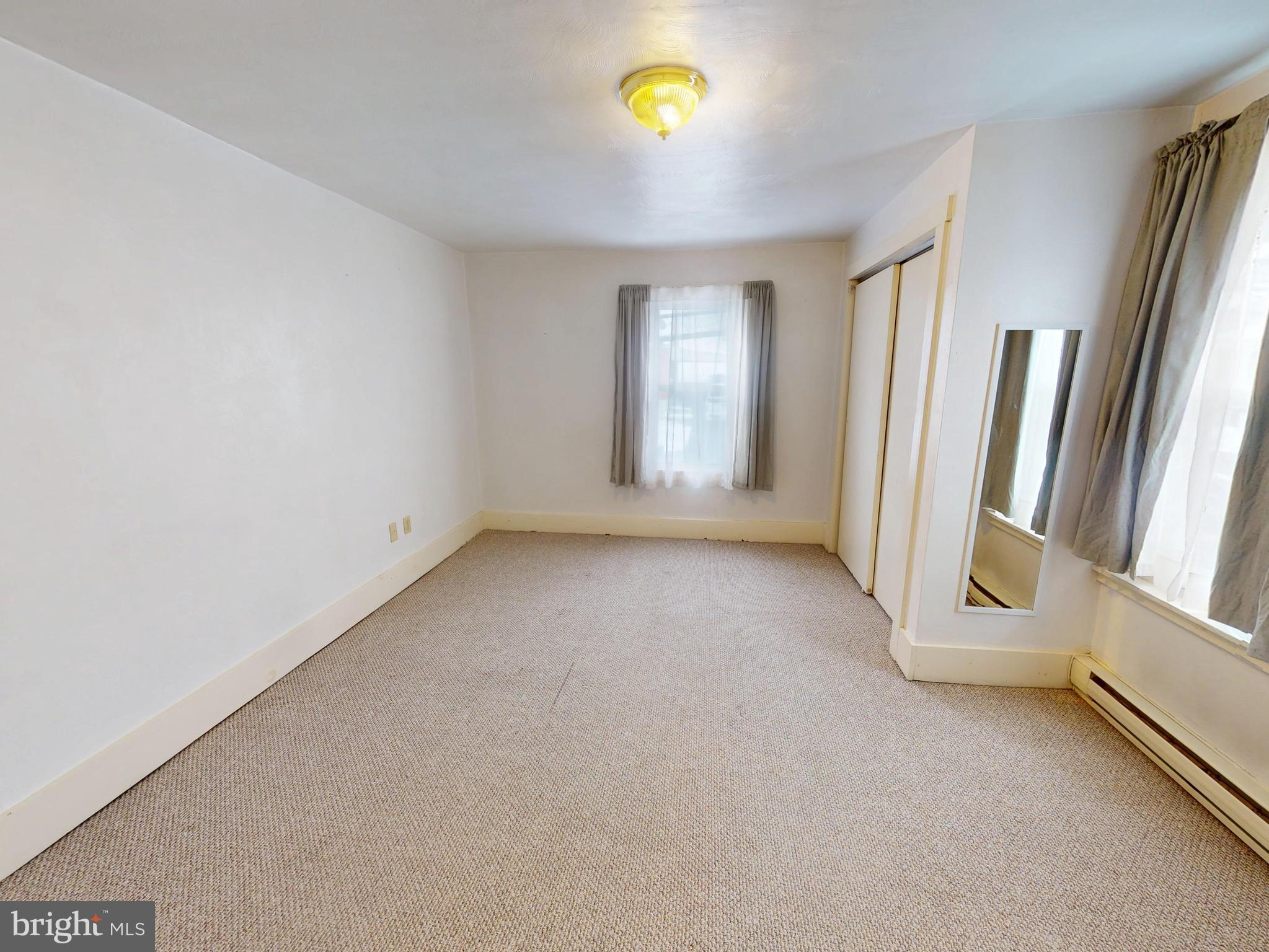 925 West Water Street Bellefonte, PA 16823 - Photo 7 of 23 an empty room with a window