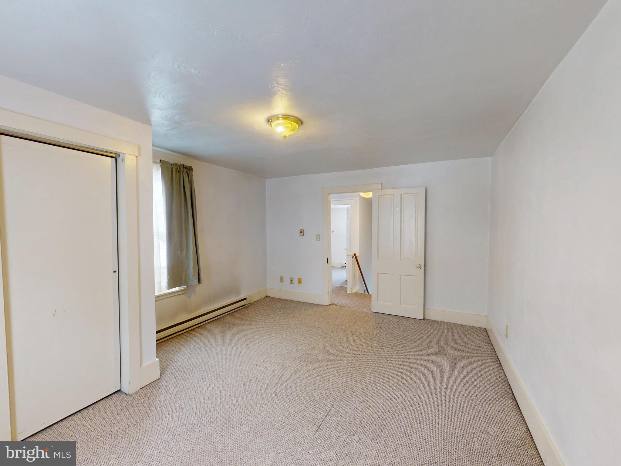 925 West Water Street Bellefonte, PA 16823 - Photo 8 of 23 an empty room with a window