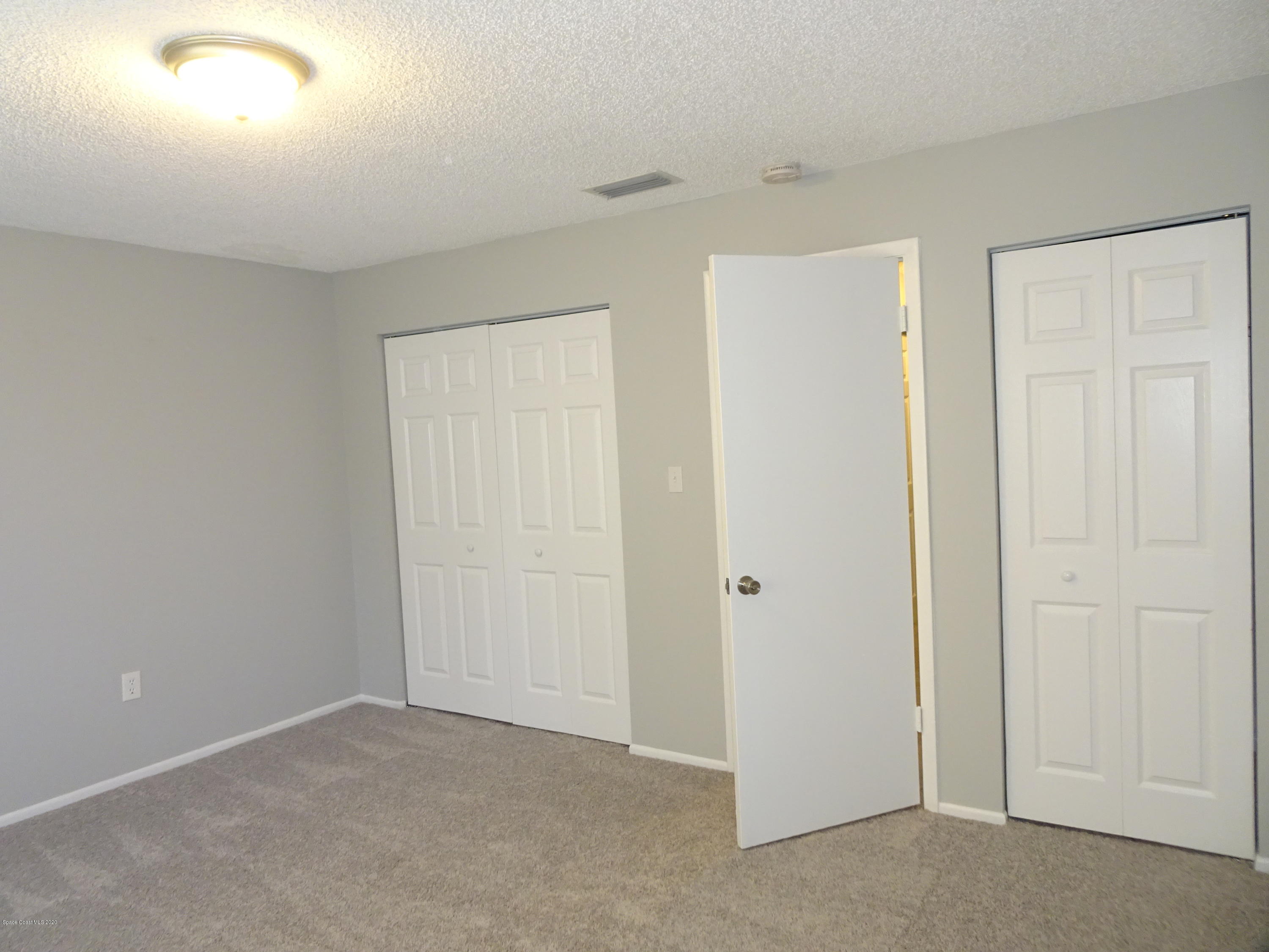 4875 Sisson Road Titusville, FL 32780 - Photo 8 of 14 a view of an empty room