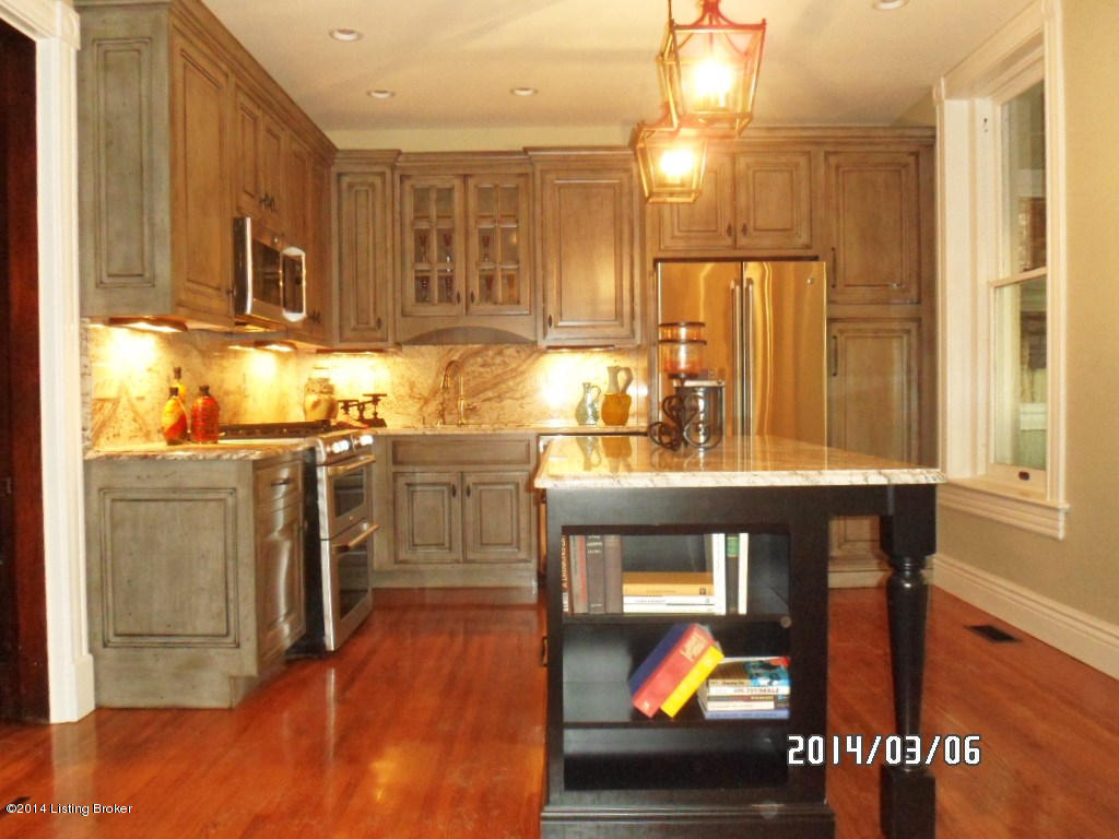 1238 Cherokee Road Louisville, KY 40204 - Photo 13 of 57 You've got light everywhere! Cans, glorious over island lanterns and under-cabinet lighting!